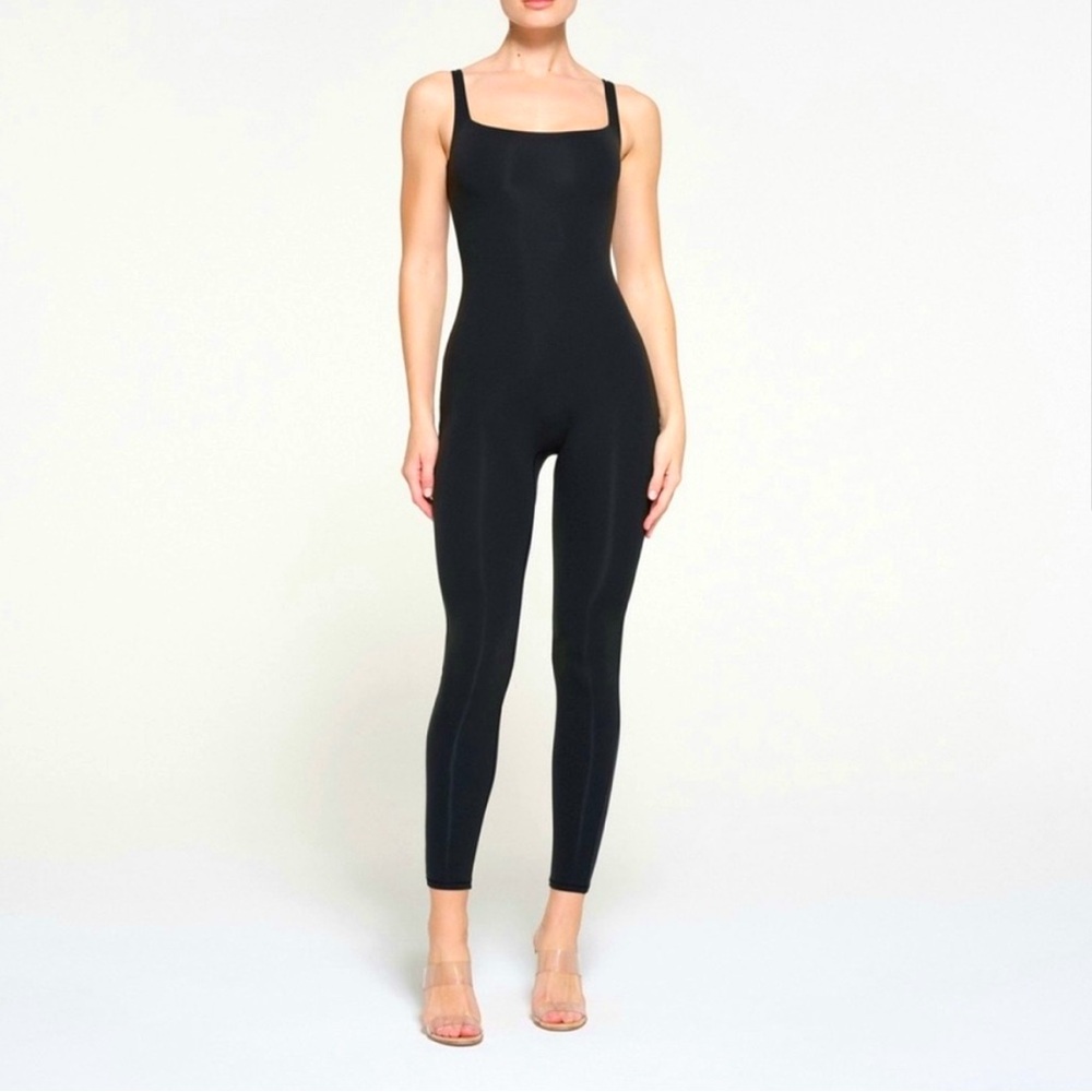 SKIMS fits everybody square neck low back onesie in color ONYX